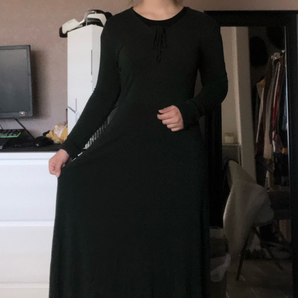 Long green dress.